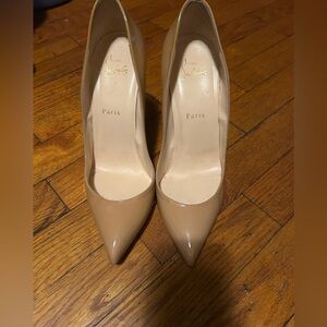 Worn Christian Loubutins. The Red bottoms can be fixed.